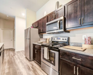 Kitchen with wood cabinets and staineless steel appliances